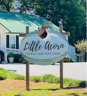 little acorn florist and gift shoplocated on 101 jefferson st.(205) 652-2423little acorn specializes in flower arrangements, speciality gift items, craft beer, a large assortment of wines, savory solutions food items, and much more !